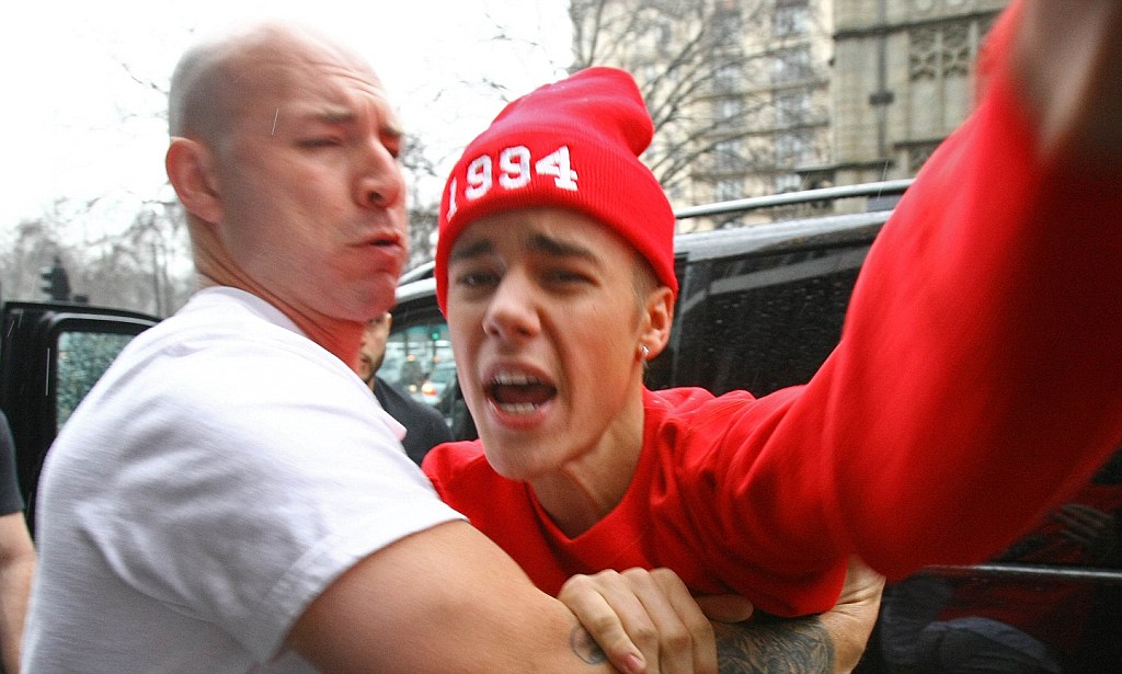 March 08, 2013 An angry Justin Bieber is pictured leaving his London hotel. Non Exclusive Worldwide Rights Pictures by : FameFlynet UK © 2013 Tel : +44 (0)20 3551 5049 Email : info@fameflynet.uk.com