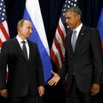 U.S. President Barack Obama extends his hand to Russian President Vladimir Putin during their meeting at the United Nations General Assembly in New York