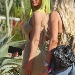 Kylie Jenner attends the Pretty Little Thing party with green hair