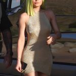 Kylie Jenner attends the Pretty Little Thing party with green hair