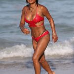 Christina Milian shows off her incredible figure in a small halter neck bikini while enjoying the sunshine with friends in Miami Beach
