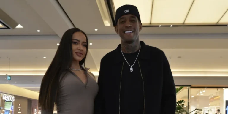 Talisca ve eşi el ele alışverişte